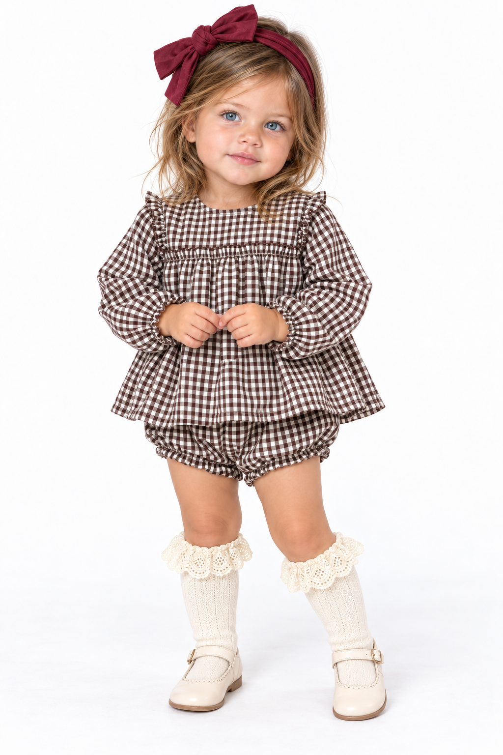 Completo Marùi bambina a quadretti marroni indossato sulla modella