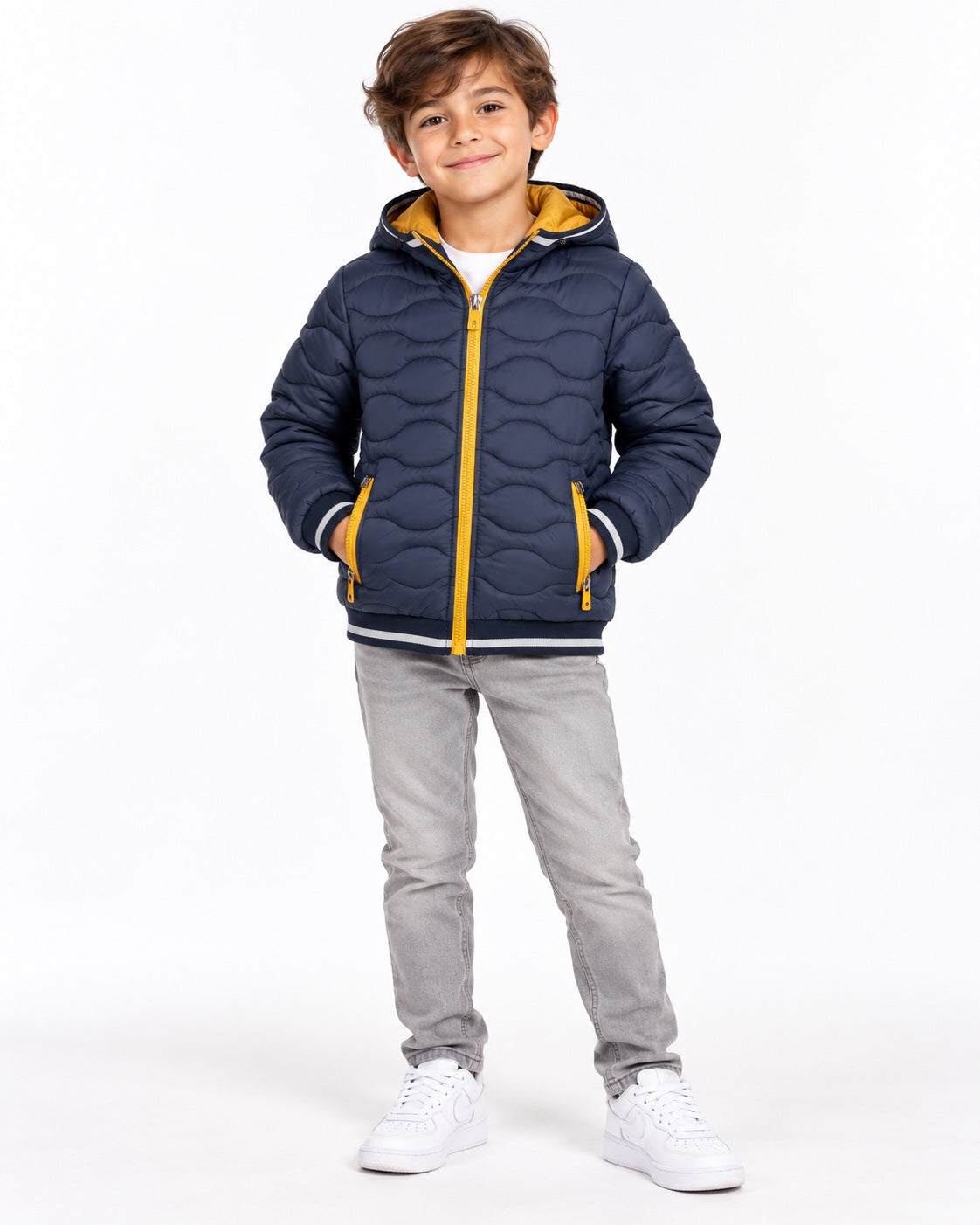 Giubbino bambino blu trapuntato con cappuccio e zip gialle