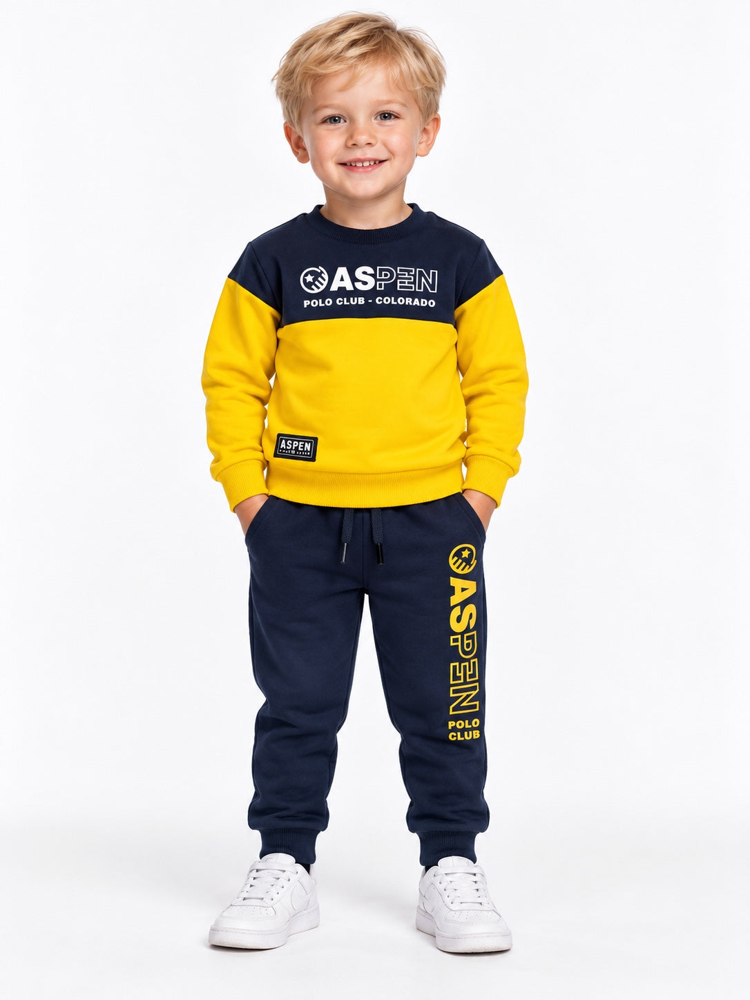 Tuta completa bambino Aspen Polo Club gialla e blu indossata
